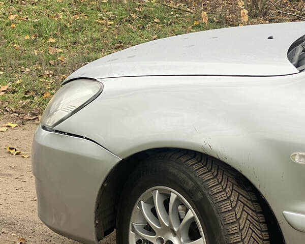 Серый Мицубиси Лансер, объемом двигателя 1.58 л и пробегом 210 тыс. км за 3900 $, фото 4 на Automoto.ua