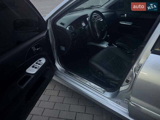 Серый Мицубиси Лансер, объемом двигателя 2 л и пробегом 188 тыс. км за 4200 $, фото 7 на Automoto.ua