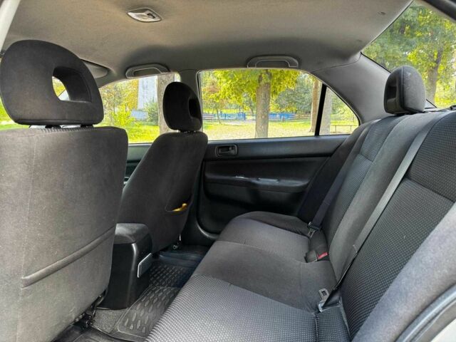 Серый Мицубиси Лансер, объемом двигателя 1.6 л и пробегом 196 тыс. км за 4390 $, фото 21 на Automoto.ua