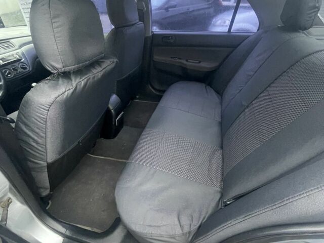 Серый Мицубиси Лансер, объемом двигателя 1.6 л и пробегом 200 тыс. км за 3906 $, фото 9 на Automoto.ua