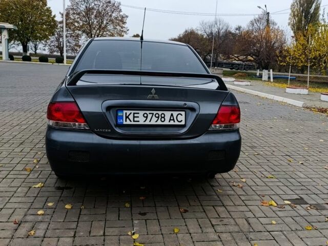 Серый Мицубиси Лансер, объемом двигателя 1.6 л и пробегом 100 тыс. км за 3500 $, фото 3 на Automoto.ua
