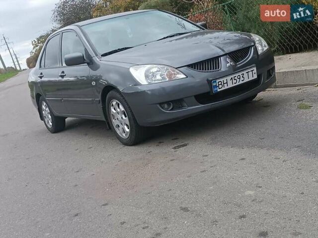 Сірий Міцубісі Lancer, об'ємом двигуна 1.58 л та пробігом 238 тис. км за 5500 $, фото 1 на Automoto.ua