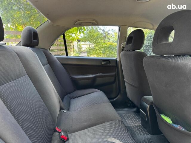 Мицубиси Лансер 2005 в Киеве на Automoto.ua Серый Мицубиси Лансер, объемом двигателя 1.6 л и пробегом 196 тыс. км за 4490 $, фото 23 на Automoto.ua