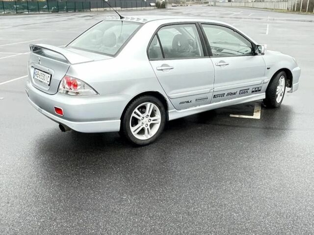 Сірий Міцубісі Lancer, об'ємом двигуна 2 л та пробігом 1 тис. км за 3500 $, фото 5 на Automoto.ua