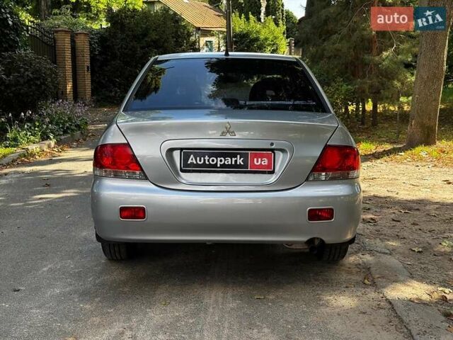 Серый Мицубиси Лансер, объемом двигателя 1.6 л и пробегом 196 тыс. км за 4490 $, фото 7 на Automoto.ua