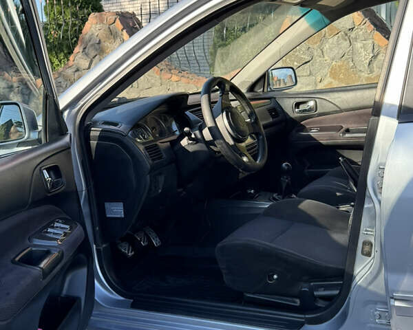 Сірий Міцубісі Lancer, об'ємом двигуна 2 л та пробігом 346 тис. км за 3200 $, фото 13 на Automoto.ua