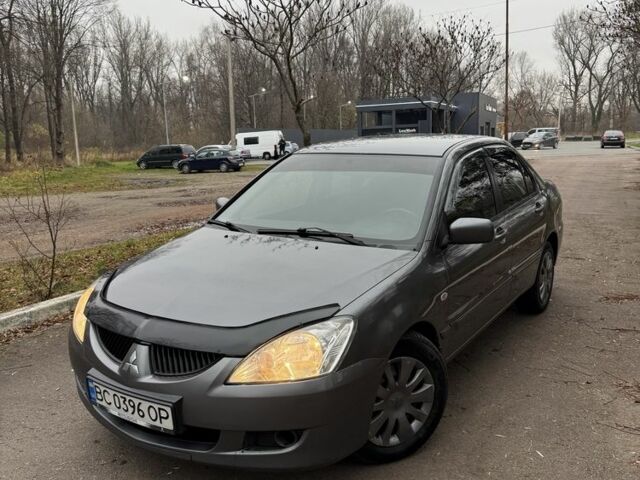 Сірий Міцубісі Lancer, об'ємом двигуна 1.6 л та пробігом 230 тис. км за 2799 $, фото 5 на Automoto.ua