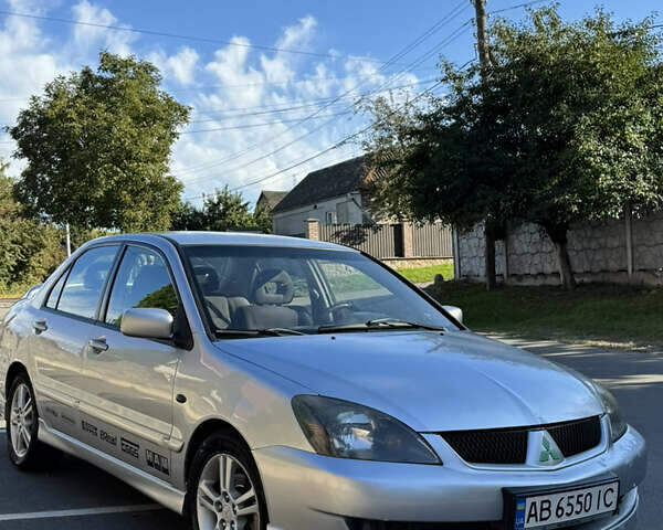 Сірий Міцубісі Lancer, об'ємом двигуна 2 л та пробігом 346 тис. км за 3200 $, фото 10 на Automoto.ua