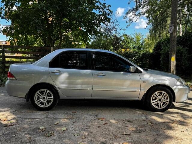 Серый Мицубиси Лансер, объемом двигателя 1.6 л и пробегом 196 тыс. км за 4390 $, фото 5 на Automoto.ua