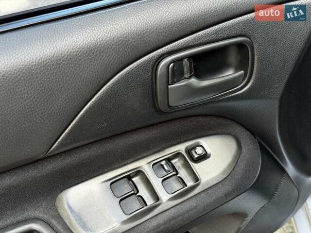 Серый Мицубиси Лансер, объемом двигателя 1.6 л и пробегом 196 тыс. км за 4490 $, фото 12 на Automoto.ua