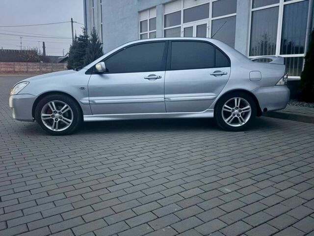 Сірий Міцубісі Lancer, об'ємом двигуна 2 л та пробігом 187 тис. км за 4497 $, фото 1 на Automoto.ua