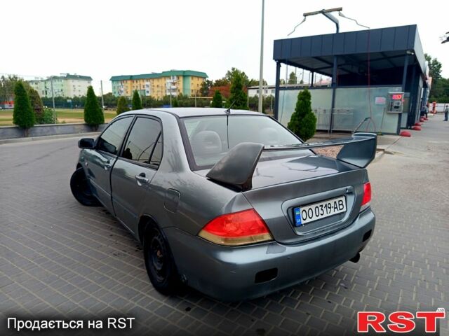 Сірий Міцубісі Lancer, об'ємом двигуна 1.6 л та пробігом 0 тис. км за 3000 $, фото 2 на Automoto.ua
