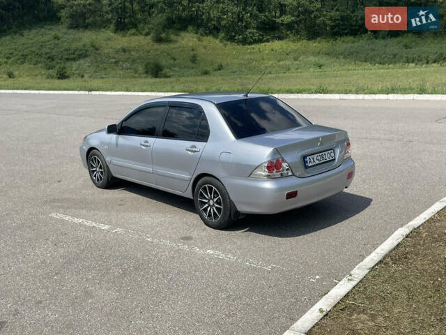 Мицубиси Лансер 2005 в Харькове на Automoto.ua Серый Мицубиси Лансер, объемом двигателя 1.58 л и пробегом 240 тыс. км за 4500 $, фото 3 на Automoto.ua