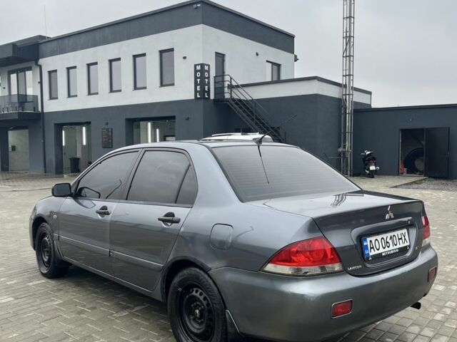 Сірий Міцубісі Lancer, об'ємом двигуна 1.6 л та пробігом 231 тис. км за 3500 $, фото 4 на Automoto.ua