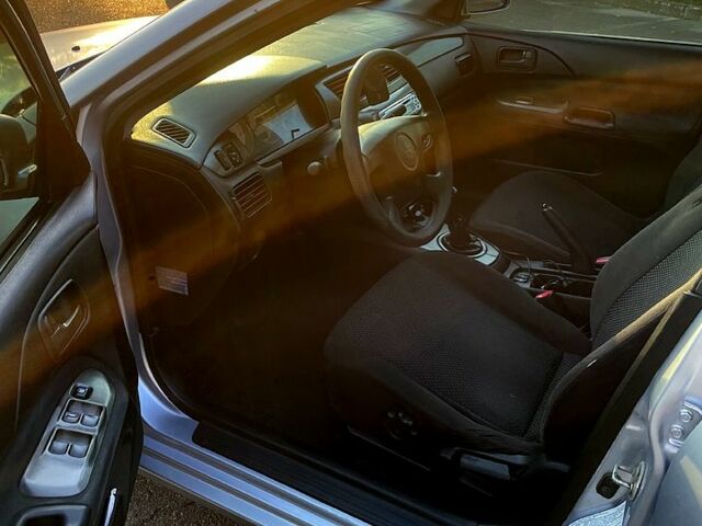Сірий Міцубісі Lancer, об'ємом двигуна 1.6 л та пробігом 282 тис. км за 4100 $, фото 10 на Automoto.ua