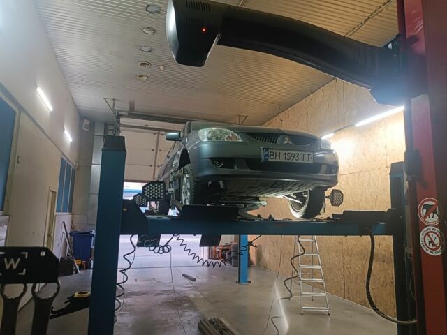 Серый Мицубиси Лансер, объемом двигателя 1.6 л и пробегом 242 тыс. км за 4600 $, фото 2 на Automoto.ua