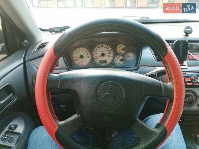 Мицубиси Лансер 2005 в Мукачеве на Automoto.ua Серый Мицубиси Лансер, объемом двигателя 1.6 л и пробегом 416 тыс. км за 4000 $, фото 8 на Automoto.ua