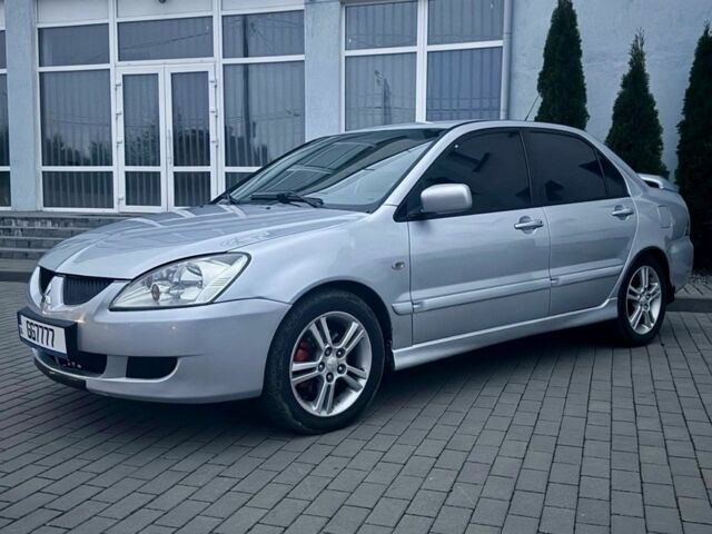 Сірий Міцубісі Lancer, об'ємом двигуна 2 л та пробігом 187 тис. км за 4497 $, фото 3 на Automoto.ua