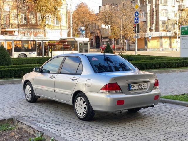 Міцубісі Lancer 2005 у Запоріжжя на Automoto.ua Сірий Міцубісі Lancer, об'ємом двигуна 1.6 л та пробігом 200 тис. км за 3850 $, фото 4 на Automoto.ua