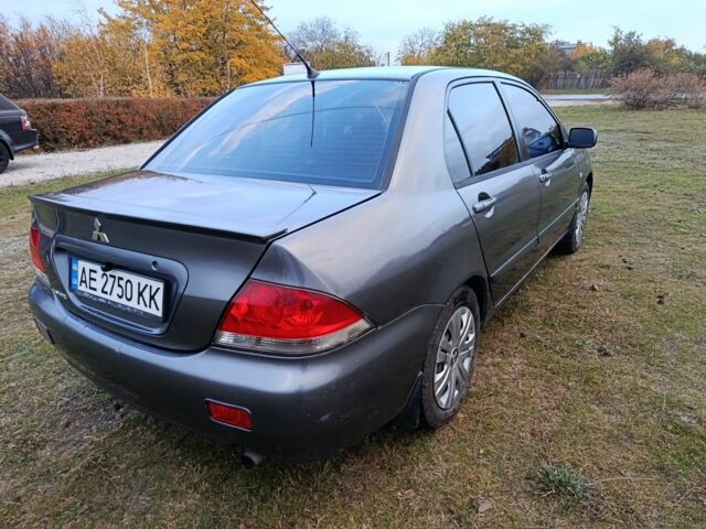 Міцубісі Lancer 2005 у Кам'янське (Дніпродзержинськ) на Automoto.ua Сірий Міцубісі Lancer, об'ємом двигуна 1.6 л та пробігом 220 тис. км за 4100 $, фото 7 на Automoto.ua