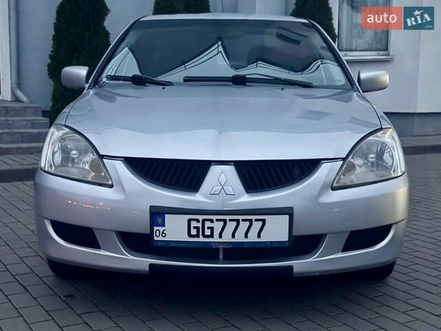 Сірий Міцубісі Lancer, об'ємом двигуна 2 л та пробігом 187 тис. км за 4600 $, фото 5 на Automoto.ua