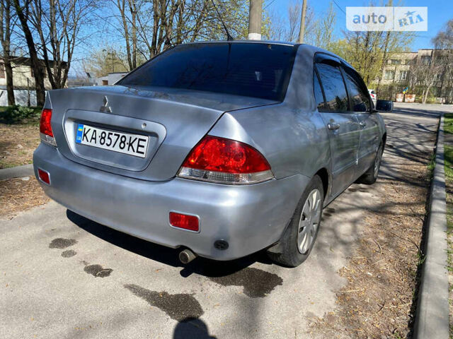 Сірий Міцубісі Lancer, об'ємом двигуна 1.6 л та пробігом 228 тис. км за 3999 $, фото 1 на Automoto.ua