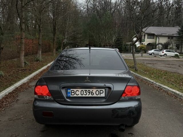 Сірий Міцубісі Lancer, об'ємом двигуна 1.6 л та пробігом 230 тис. км за 2799 $, фото 18 на Automoto.ua