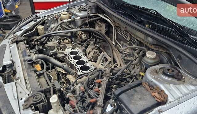Сірий Міцубісі Lancer, об'ємом двигуна 1.58 л та пробігом 250 тис. км за 5000 $, фото 7 на Automoto.ua