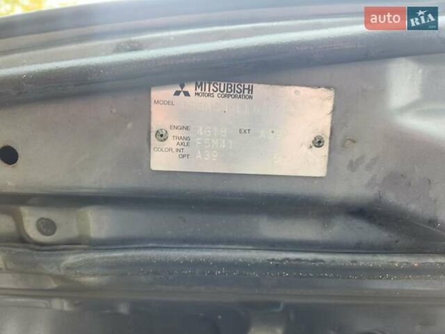 Серый Мицубиси Лансер, объемом двигателя 1.58 л и пробегом 293 тыс. км за 4000 $, фото 28 на Automoto.ua