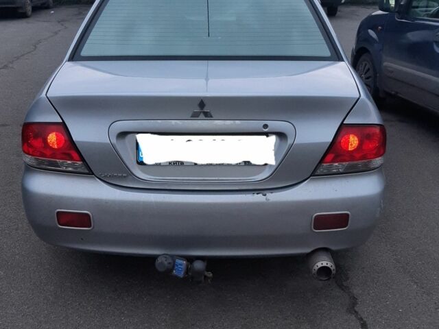Сірий Міцубісі Lancer, об'ємом двигуна 1.6 л та пробігом 27 тис. км за 4200 $, фото 3 на Automoto.ua