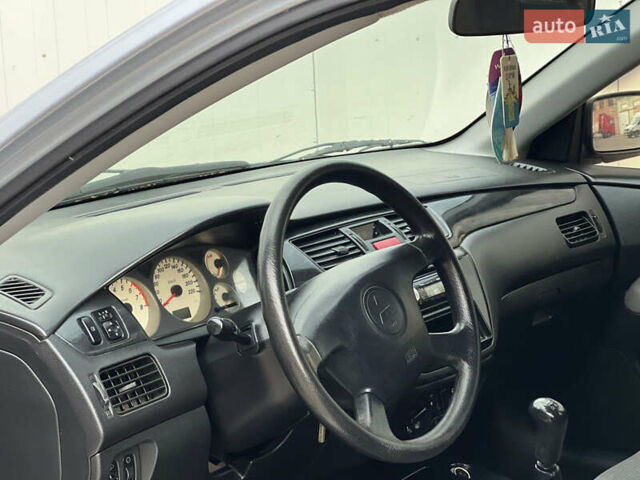 Сірий Міцубісі Lancer, об'ємом двигуна 1.6 л та пробігом 310 тис. км за 3350 $, фото 22 на Automoto.ua
