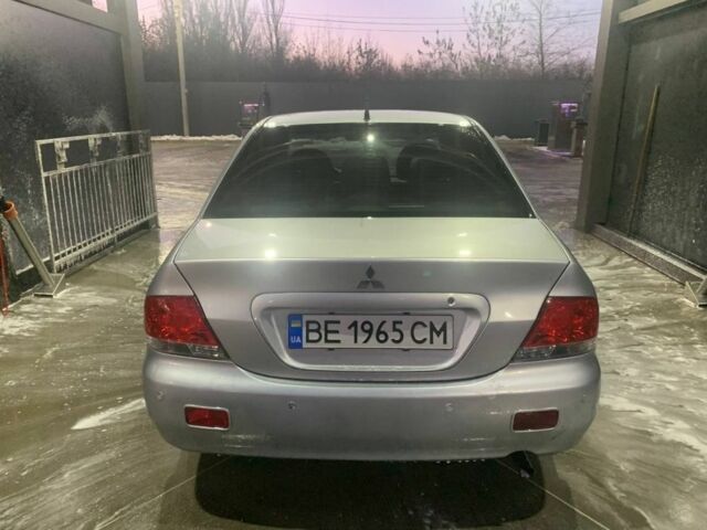 Сірий Міцубісі Lancer, об'ємом двигуна 1.6 л та пробігом 316 тис. км за 3500 $, фото 6 на Automoto.ua