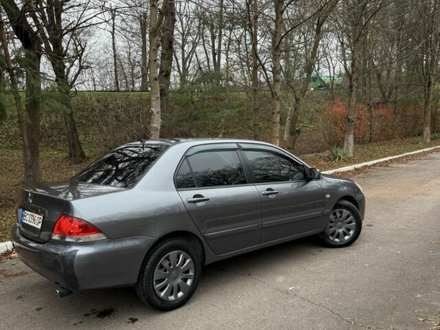 Сірий Міцубісі Lancer, об'ємом двигуна 1.6 л та пробігом 230 тис. км за 2799 $, фото 17 на Automoto.ua