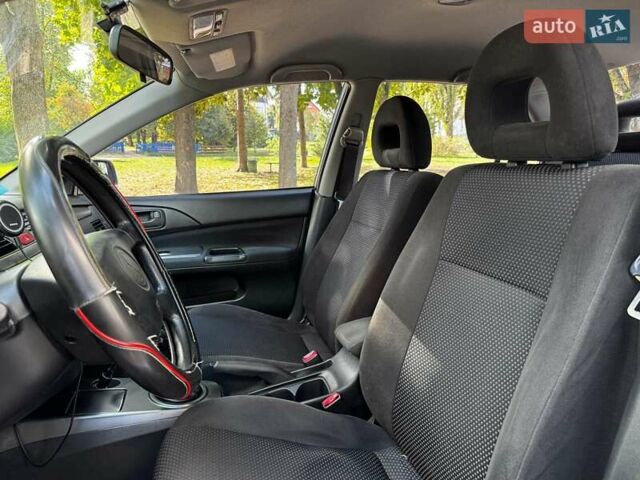 Серый Мицубиси Лансер, объемом двигателя 1.6 л и пробегом 196 тыс. км за 4490 $, фото 16 на Automoto.ua