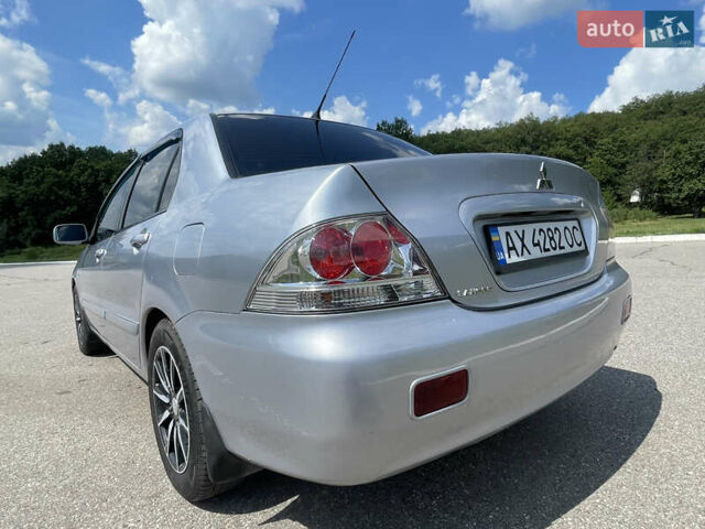 Мицубиси Лансер 2005 в Харькове на Automoto.ua Серый Мицубиси Лансер, объемом двигателя 1.58 л и пробегом 240 тыс. км за 4500 $, фото 4 на Automoto.ua