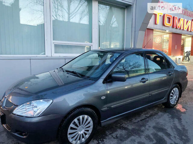 Сірий Міцубісі Lancer, об'ємом двигуна 1.6 л та пробігом 224 тис. км за 4350 $, фото 7 на Automoto.ua