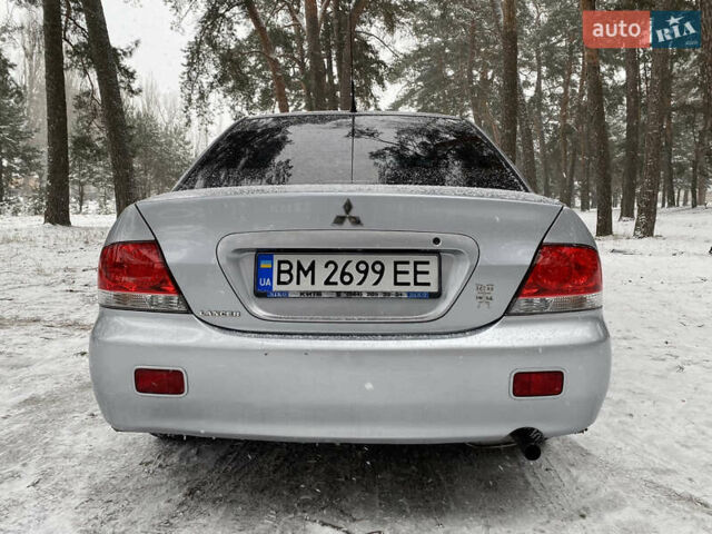 Серый Мицубиси Лансер, объемом двигателя 1.58 л и пробегом 225 тыс. км за 3950 $, фото 8 на Automoto.ua