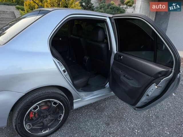 Сірий Міцубісі Lancer, об'ємом двигуна 2 л та пробігом 360 тис. км за 3400 $, фото 29 на Automoto.ua