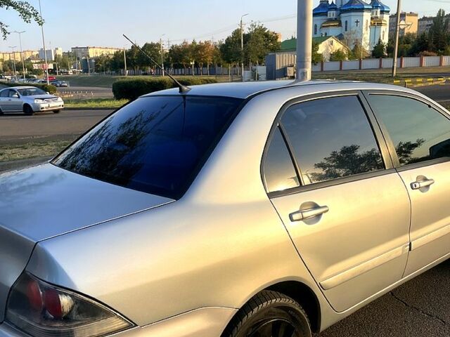Сірий Міцубісі Lancer, об'ємом двигуна 1.6 л та пробігом 282 тис. км за 4100 $, фото 5 на Automoto.ua