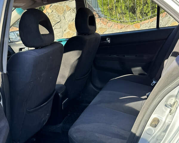 Сірий Міцубісі Lancer, об'ємом двигуна 2 л та пробігом 346 тис. км за 3200 $, фото 15 на Automoto.ua
