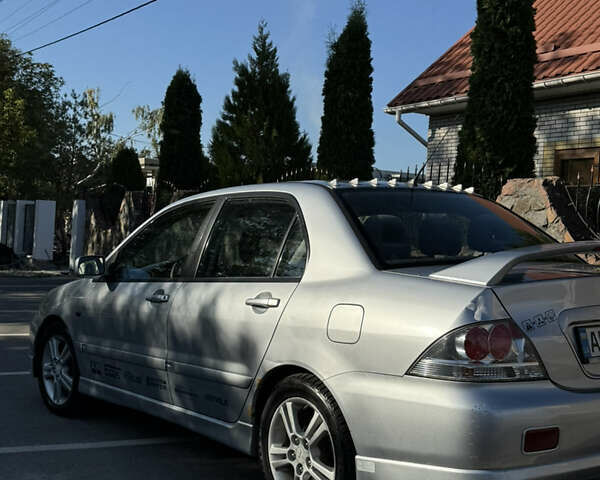 Сірий Міцубісі Lancer, об'ємом двигуна 2 л та пробігом 346 тис. км за 3200 $, фото 17 на Automoto.ua