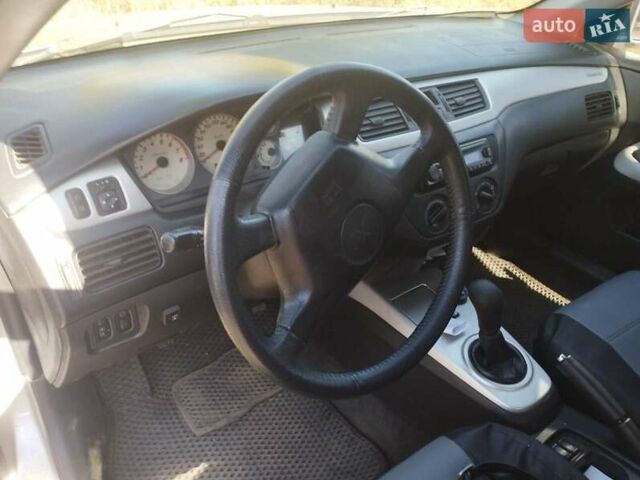 Сірий Міцубісі Lancer, об'ємом двигуна 1.6 л та пробігом 244 тис. км за 3300 $, фото 10 на Automoto.ua