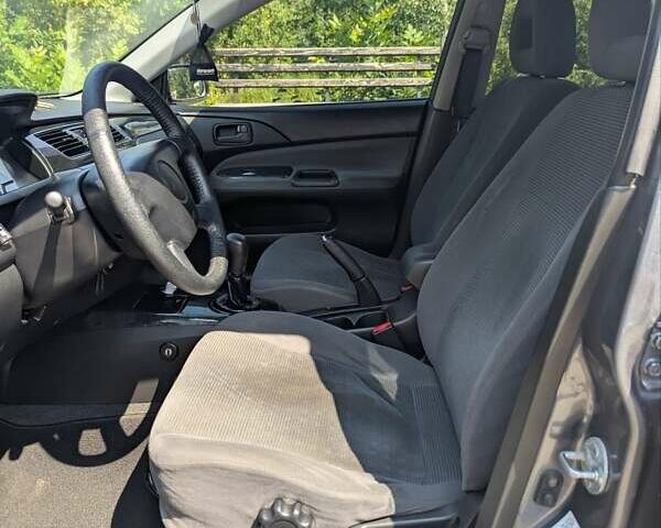 Сірий Міцубісі Lancer, об'ємом двигуна 1.58 л та пробігом 384 тис. км за 2500 $, фото 2 на Automoto.ua