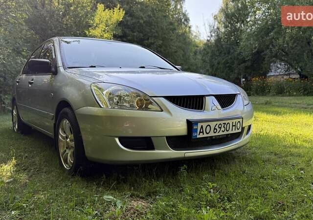 Серый Мицубиси Лансер, объемом двигателя 1.58 л и пробегом 300 тыс. км за 4500 $, фото 8 на Automoto.ua