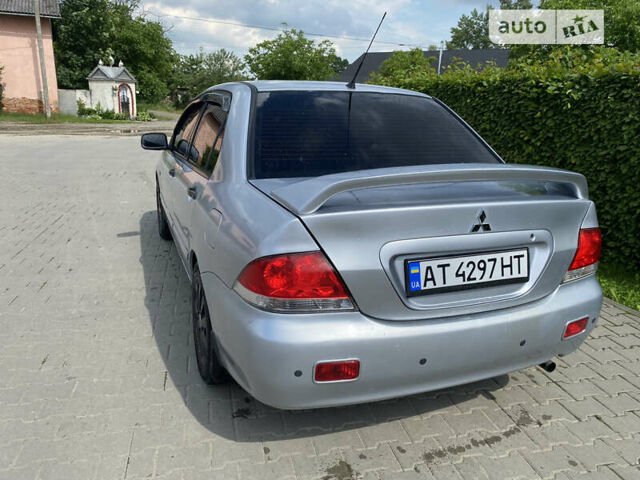 Сірий Міцубісі Lancer, об'ємом двигуна 1.6 л та пробігом 146 тис. км за 4499 $, фото 2 на Automoto.ua