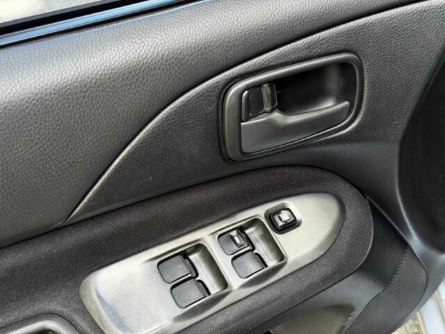 Серый Мицубиси Лансер, объемом двигателя 1.6 л и пробегом 196 тыс. км за 4390 $, фото 12 на Automoto.ua