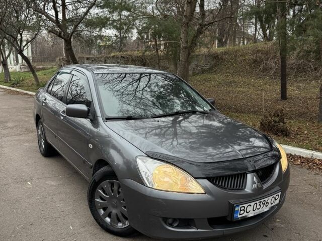 Сірий Міцубісі Lancer, об'ємом двигуна 1.6 л та пробігом 230 тис. км за 2799 $, фото 8 на Automoto.ua