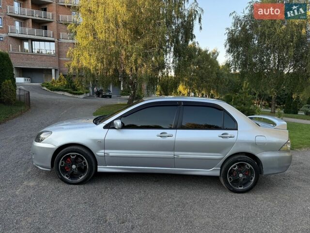 Сірий Міцубісі Lancer, об'ємом двигуна 2 л та пробігом 360 тис. км за 3400 $, фото 6 на Automoto.ua