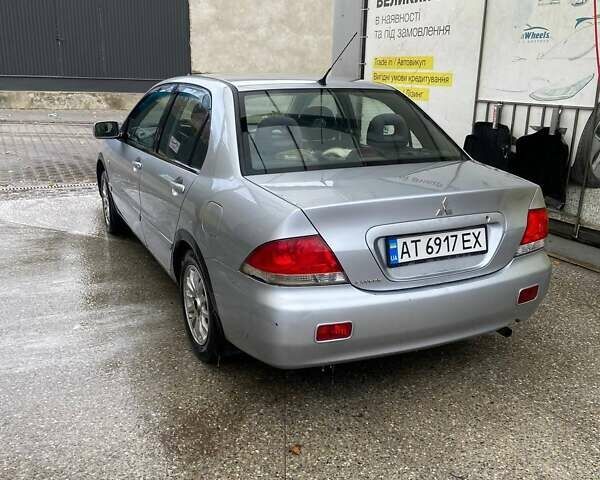 Мицубиси Лансер 2005 в Черновцах на Automoto.ua Серый Мицубиси Лансер, объемом двигателя 1.58 л и пробегом 315 тыс. км за 3000 $, фото 4 на Automoto.ua
