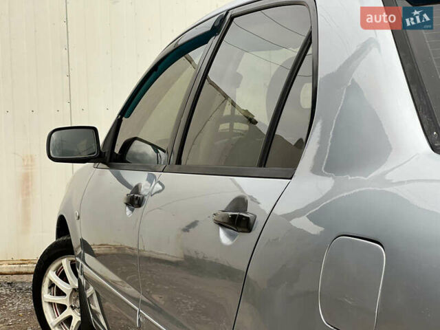 Сірий Міцубісі Lancer, об'ємом двигуна 1.6 л та пробігом 310 тис. км за 3350 $, фото 20 на Automoto.ua